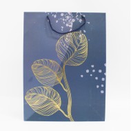 Dāvanu maisiņš ar ģeometrisku apdruku un virves rokturiem, 31×41×12 cm, 1 gab.